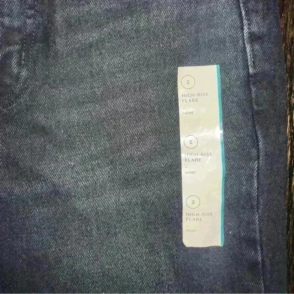 Universal thread High rise flare black jeans. Size 2.‎ Fitted hip. Flared leg.